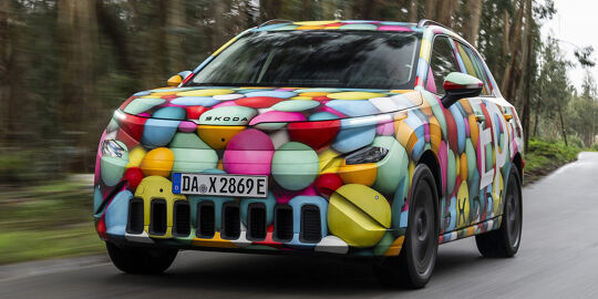 Škoda Epiq Content Linksvoor Rijdend Bos